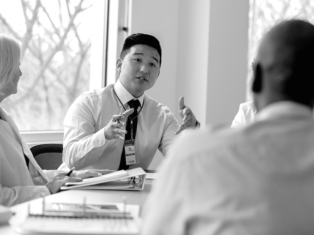 Colleagues sitting around a table